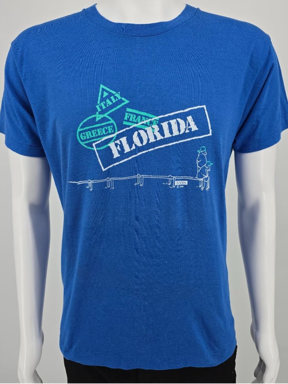 Vintage 1980s Screen Stars Guindon Cartoon Florida Passport Stamps T-Shirt (M/L)